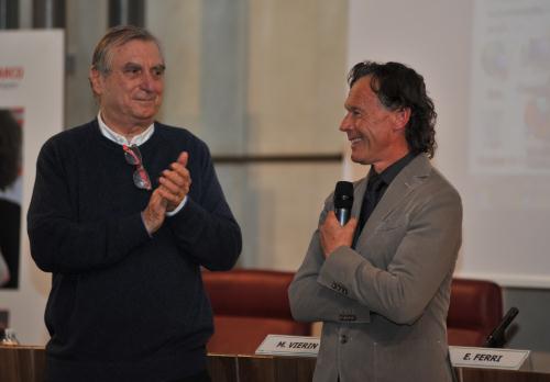 Il Dottor Costa, medico "papà di tutti i campioni del motociclismo", insieme a Virginio Ferrari, campione del passato
