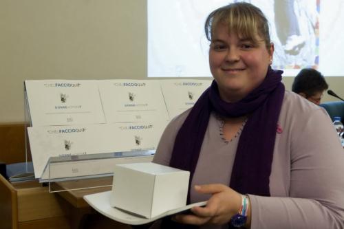 Un sourire après la remise du prix