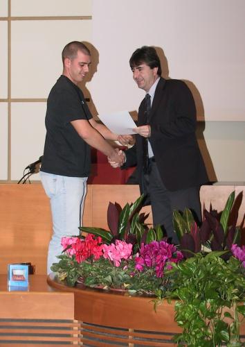 La rencontre avec les étudiants valdôtains intervenus à l'initiative "Objectif jeunes: tests de démocratie" à l'occasion du Salon européen de la Communication administration publique(COM-PA) de Bologne du novembre 2004